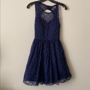 Blue lace semi-formal dress. Open back.